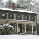 Federal style house in snow